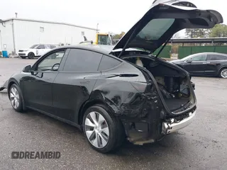 2022 Tesla Model Y Performance with VIN 7SAYGDEF7NF403701, listed as a IAAI auction lot 41961532 with 83,728 mi miles and . Bid and sale history available at DreamBid. Image 3.