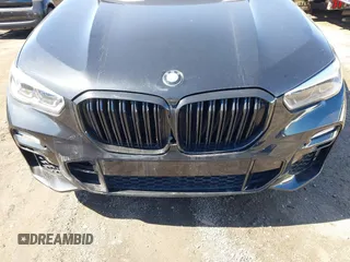 2019 BMW X5 xDrive50i with VIN 5UXJU2C5XKLN66873, listed as a IAAI auction lot 41472246 with 98,571 mi miles. Bid and sale history available at carsss.com. Image 6.