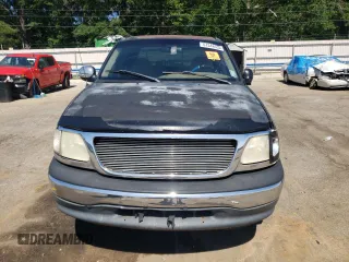 2001 Ford F-150 XLT with VIN 1FTRW07L81KE00951, listed as a Copart auction lot 57348535 with Not provided miles and Salvage title. Bid and sale history available at DreamBid. Image 5.