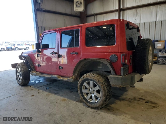 2012 Jeep Wrangler Unlimited Sahara with VIN 1C4BJWEG3CL179457, listed as a Copart auction lot 42768745 with 162,075 mi miles and Salvage Title. Bid and sale history available at carsss.com. Image 2.