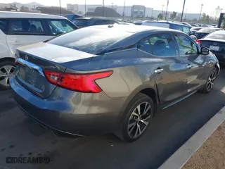 2018 Nissan Maxima SL with VIN 1N4AA6AP0JC363808, listed as a IAAI auction lot 41231430 with 142,955 mi miles. Bid and sale history available at carsss.com. Image 4.