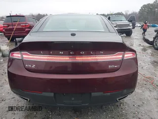 2013 Lincoln MKZ z VIN 3LN6L2G96DR825348, wystawiony jako IAAI lot #41553933 z przebiegiem 43 529 mil mil oraz . Historia ofert i sprzedaży dostępna na DreamBid. Obrazek 16.