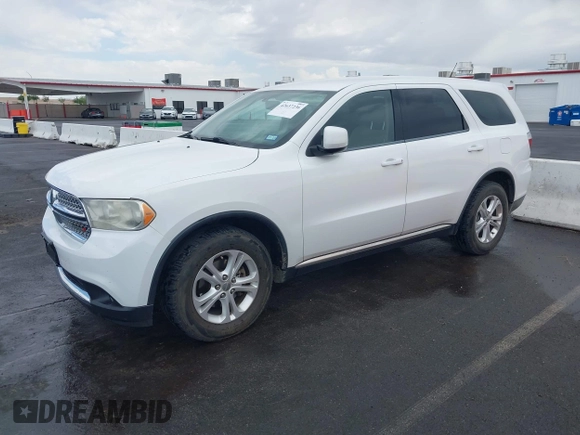 2013 Dodge Durango SXT with VIN 1C4RDJAG7DC659050, listed as a IAAI auction lot 42637236 with 162,458 mi miles and . Bid and sale history available at DreamBid. Image 18.