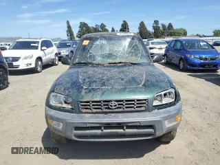 1999 Toyota RAV4 with VIN JT3GP10V9X7044726, listed as a Copart auction lot 55180935 with 196,509 mi miles and Salvage Title. Bid and sale history available at DreamBid. Image 5.