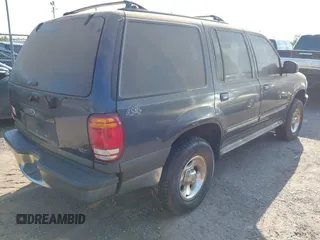 1999 Ford Explorer XL z VIN 1FMZU34XXXUB25039, wystawiony jako IAAI lot #42290828 z przebiegiem 146 874 mil mil oraz . Historia ofert i sprzedaży dostępna na DreamBid. Obrazek 4.