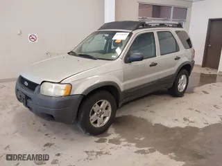 2004 Ford Escape XLT with VIN 1FMYU93164KB05521, listed as a IAAI auction lot 41723219 with 246,369 mi miles. Bid and sale history available at carsss.com. Image 18.