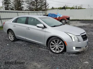 2016 Cadillac XTS Luxury Collection z VIN 2G61N5S31G9194437, wystawiony jako Copart lot #56017485 z przebiegiem 75 979 mil mil oraz Szkody całkowita. Historia ofert i sprzedaży dostępna na DreamBid. Obrazek 4.