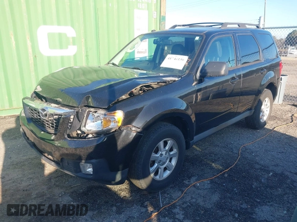 2010 Mazda Tribute Sport with VIN 4F2CY9C74AKM03679, listed as a IAAI auction lot 41740156 with 142,208 mi miles and . Bid and sale history available at DreamBid. Image 2.