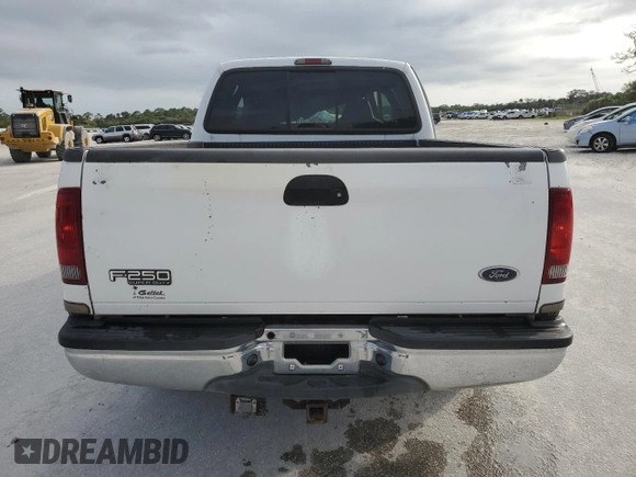 2002 Ford F-250 XL with VIN 1FTNW20S32EA38538, listed as a Copart auction lot 76174884 with 203,007 mi miles and Non Repairable. Bid and sale history available at DreamBid. Image 6.
