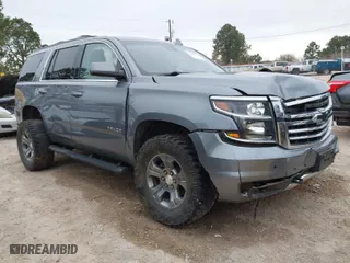2019 Chevrolet Tahoe LT with VIN 1GNSKBKC8KR283954, listed as a IAAI auction lot 41587485 with 110,631 mi miles. Bid and sale history available at carsss.com. Image 1.
