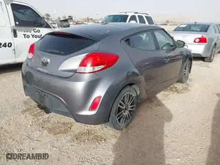 2015 Hyundai Veloster RE:FLEX with VIN KMHTC6AD1FU232984, listed as a IAAI auction lot 41570593 with 180,435 mi miles. Bid and sale history available at carsss.com. Image 4.