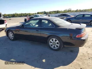 1997 Lexus SC with VIN JT8CH32Y5V0052465, listed as a Copart auction lot 74328664 with 107,353 mi miles and Salvage Title. Bid and sale history available at carsss.com. Image 2.