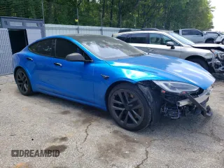 2021 Tesla Model S Plaid with VIN 5YJSA1E64MF438794, listed as a Copart auction lot 56903365 with 63,671 mi miles and Salvage title. Bid and sale history available at DreamBid. Image 4.