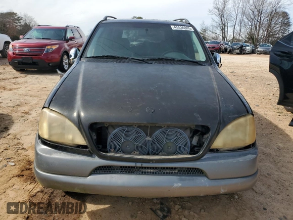 1999 Mercedes-Benz M 320/430/500 z VIN 4JGAB54E0XA060572, wystawiony jako Copart lot #45536805 z przebiegiem 215 210 mil mil oraz Szkoda całkowita • Salvage title. Historia ofert i sprzedaży dostępna na DreamBid. Obrazek 5.
