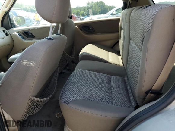 2004 Ford Escape XLT with VIN 1FMCU03134KB53192, listed as a Copart auction lot 62178075 with 223,637 mi miles and Salvage title. Bid and sale history available at DreamBid. Image 11.