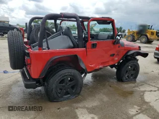2000 Jeep Wrangler SE with VIN 1J4FA29P6YP793045, listed as a Copart auction lot 58756715 with 202,110 mi miles and Salvage title. Bid and sale history available at DreamBid. Image 3.