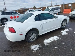 2000 Ford Mustang z VIN 1FAFP4049YF296568, wystawiony jako IAAI lot #41598325 z przebiegiem 144 186 mil mil oraz . Historia ofert i sprzedaży dostępna na DreamBid. Obrazek 4.
