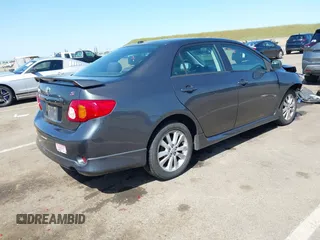 2009 Toyota Corolla with VIN 1NXBU40E69Z034459, listed as a IAAI auction lot 42095649 with 173,296 mi miles. Bid and sale history available at carsss.com. Image 4.
