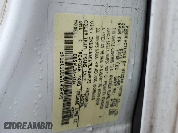 2007 Nissan Versa 1.8 SL with VIN 3N1BC11E67L402475, listed as a Copart auction lot 84464734 with 62,399 mi miles and Salvage Title. Bid and sale history available at carsss.com. Image 12.