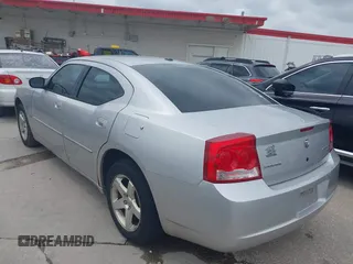 2010 Dodge Charger SXT with VIN 2B3CA3CV2AH227658, listed as a IAAI auction lot 42101656 with 162,392 mi miles. Bid and sale history available at carsss.com. Image 3.