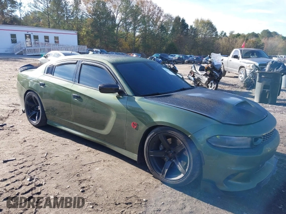 2019 Dodge Charger Scat Pack with VIN 2C3CDXGJ4KH572619, listed as a IAAI auction lot 40973015 with 40,148 mi miles and . Bid and sale history available at DreamBid. Image 1.