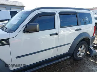 2008 Dodge Nitro SXT with VIN 1D8GU28K18W113714, listed as a IAAI auction lot 41671938 with 118,629 mi miles. Bid and sale history available at carsss.com. Image 15.