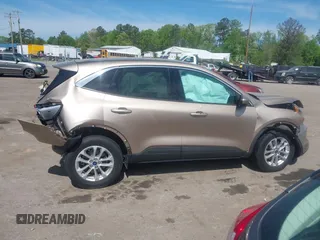 2020 Ford Escape SE with VIN 1FMCU9G6XLUA25108, listed as a IAAI auction lot 42106136 with 73,746 mi miles and . Bid and sale history available at DreamBid. Image 13.