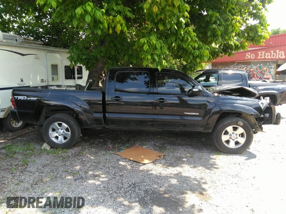 2014 Toyota Tacoma with VIN 3TMMU4FN6EM072471, listed as a IAAI auction lot 42525218 with 150,461 mi miles and . Bid and sale history available at DreamBid. Image 14.