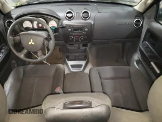 2006 Mitsubishi Raider LS with VIN 1Z7HC28K56S537721, listed as a Copart auction lot 83036764 with 114,576 mi miles and Salvage Title. Bid and sale history available at carsss.com. Image 8.