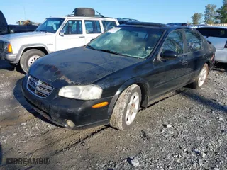 2000 Nissan Maxima GXE with VIN JN1CA31DXYT509314, listed as a IAAI auction lot 41762697 with 282,425 mi miles. Bid and sale history available at carsss.com. Image 2.