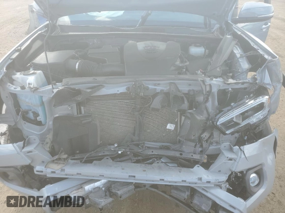 2021 Toyota Tacoma SR5 with VIN 3TMDZ5BN9MM099515, listed as a Copart auction lot 56687385 with 66,721 mi miles and Salvage title. Bid and sale history available at DreamBid. Image 11.