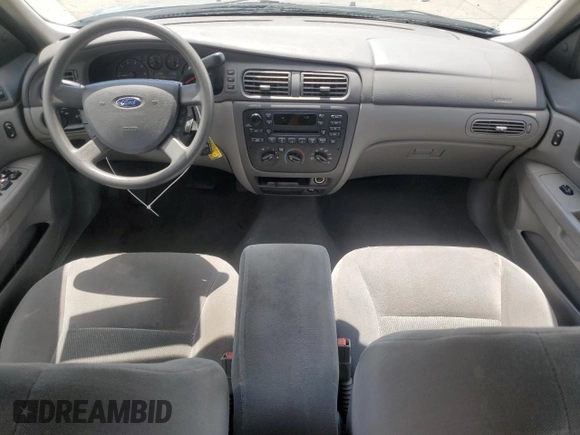 2006 Ford Taurus SE with VIN 1FAHP53296A241444, listed as a Copart auction lot 58343615 with 125,385 mi miles and Salvage title. Bid and sale history available at DreamBid. Image 8.