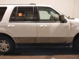 2003 Ford Expedition Special Service z VIN 1FMPU16L63LB50445, wystawiony jako IAAI lot #41445377 z przebiegiem 206 264 mil mil oraz . Historia ofert i sprzedaży dostępna na DreamBid. Obrazek 13.