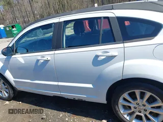 2011 Dodge Caliber Heat with VIN 1B3CB5HA6BD179014, listed as a IAAI auction lot 41704508 with 188,127 mi miles and . Bid and sale history available at DreamBid. Image 14.