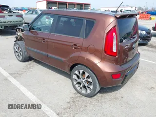 2012 Kia Soul + with VIN KNDJT2A63C7422074, listed as a IAAI auction lot 41911029 with 112,125 mi miles. Bid and sale history available at carsss.com. Image 3.
