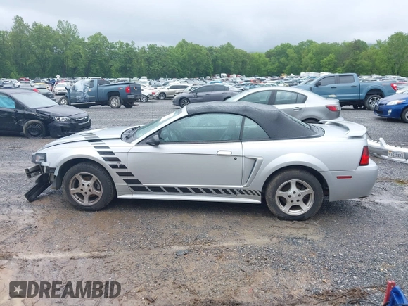 2002 Ford Mustang Deluxe z VIN 1FAFP44492F221578, wystawiony jako IAAI lot #42242232 z przebiegiem 107 773 mil mil oraz . Historia ofert i sprzedaży dostępna na DreamBid. Obrazek 15.