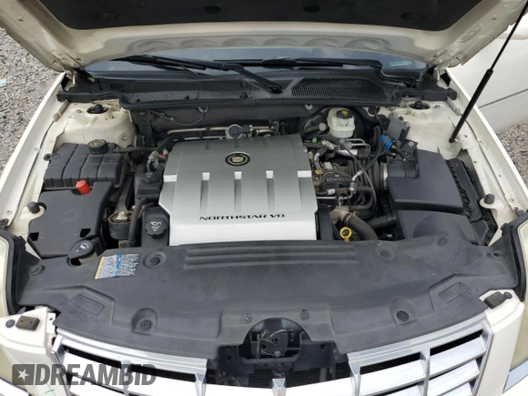 2006 Cadillac DTS 1SC z VIN 1G6KD57Y26U177384, wystawiony jako Copart lot #58200665 z przebiegiem 122 356 mil mil oraz Szkoda całkowita • Salvage title. Historia ofert i sprzedaży dostępna na DreamBid. Obrazek 11.