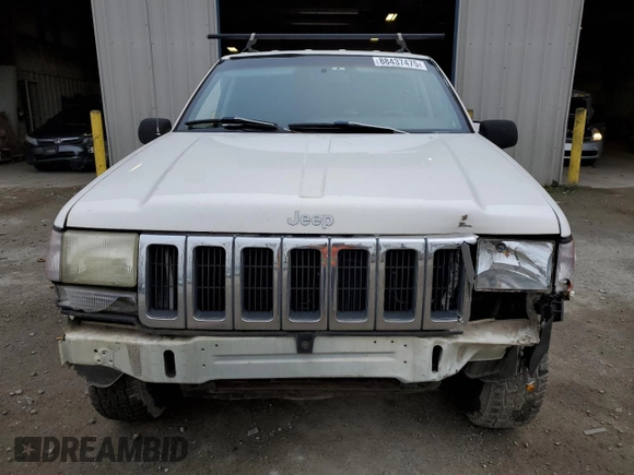 1997 Jeep Grand Cherokee Laredo with VIN 1J4GZ58SXVC597519, listed as a Copart auction lot 88437475 with 172,051 mi miles and Salvage Title. Bid and sale history available at carsss.com. Image 5.