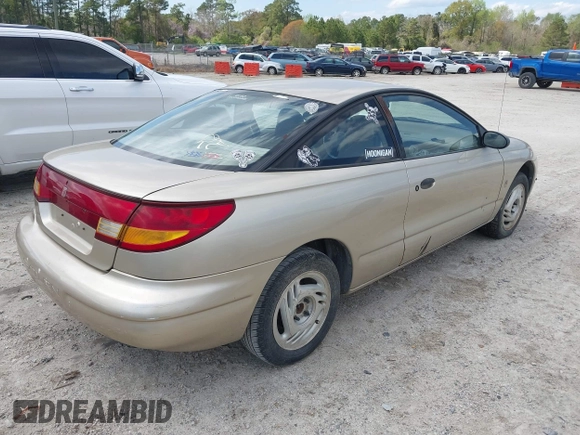 1997 Saturn SC z VIN 1G8ZE1285VZ125476, wystawiony jako IAAI lot #41832482 z przebiegiem 186 269 mil mil oraz . Historia ofert i sprzedaży dostępna na DreamBid. Obrazek 4.