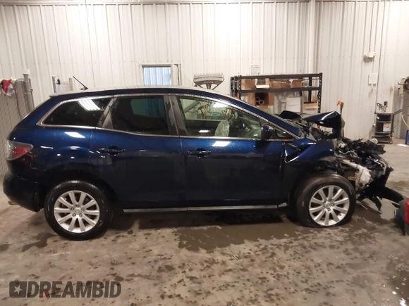 2011 Mazda CX-7 i Sport z VIN JM3ER2B56B0383257, wystawiony jako IAAI lot #42174500 z przebiegiem 122 551 mil mil oraz . Historia ofert i sprzedaży dostępna na DreamBid. Obrazek 13.