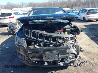 2021 Jeep Compass Freedom with VIN 3C4NJDAB0MT556781, listed as a IAAI auction lot 41601405 with 42,783 mi miles and . Bid and sale history available at carsss.com. Image 12.