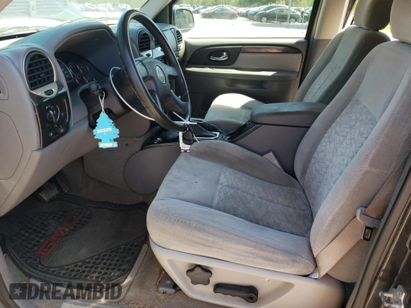 2006 GMC Envoy SLT with VIN 1GKDT13S062116733, listed as a Copart auction lot 54787325 with 172,281 mi miles and Salvage Title. Bid and sale history available at DreamBid. Image 7.