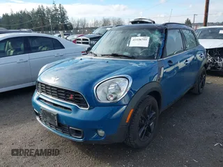 2011 MINI Countryman S z VIN WMWZC3C56BWL80093, wystawiony jako IAAI lot #41538755 z przebiegiem 108 551 mil mil oraz . Historia ofert i sprzedaży dostępna na DreamBid. Obrazek 2.