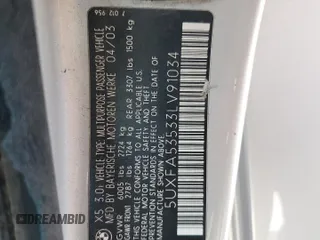 2003 BMW X5 3.0i with VIN 5UXFA53533LV91034, listed as a Copart auction lot 69153124 with 204,415 mi miles and Salvage Title. Bid and sale history available at carsss.com. Image 15.