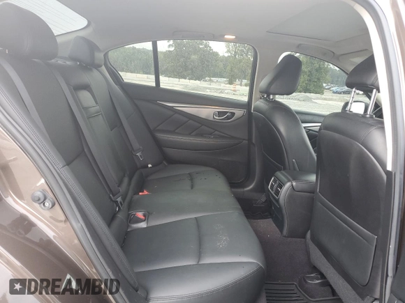 2015 Infiniti Q50 Premium z VIN JN1BV7AP5FM353448, wystawiony jako Copart lot #57115325 z przebiegiem 104 721 mil mil oraz Szkoda całkowita • Salvage title. Historia ofert i sprzedaży dostępna na DreamBid. Obrazek 10.