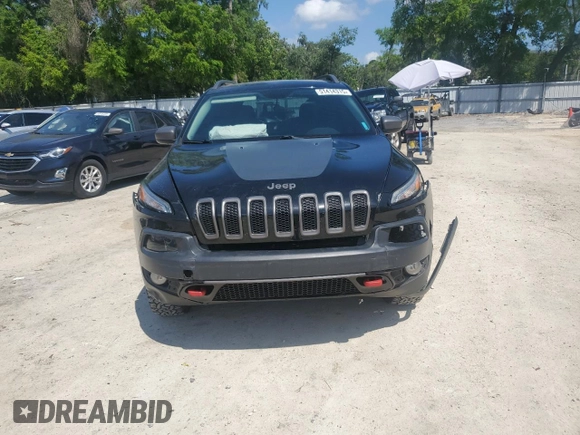 2017 Jeep Cherokee Trailhawk L Plus with VIN 1C4PJMBBXHW517252, listed as a Copart auction lot 51414315 with 185,274 mi miles and Salvage Title. Bid and sale history available at carsss.com. Image 5.