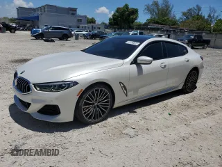 2022 BMW 8 Series 840i with VIN WBAGV4C08NCG99869, listed as a Copart auction lot 61299625 with 33,531 mi miles and Salvage title. Bid and sale history available at DreamBid. Image 1.