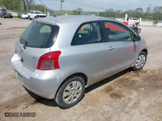 2007 Toyota Yaris with VIN JTDJT923475077877, listed as a IAAI auction lot 42073834 with 210,145 mi miles. Bid and sale history available at carsss.com. Image 4.