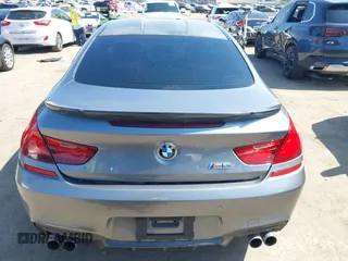 2013 BMW M6 with VIN WBSLX9C51DC968593, listed as a IAAI auction lot 42465979 with 88,010 mi miles and . Bid and sale history available at DreamBid. Image 16.