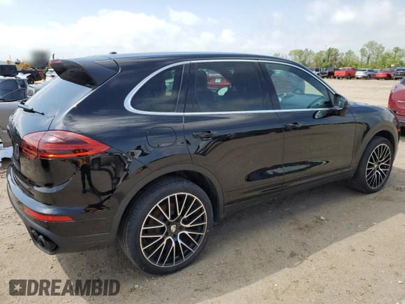 2018 Porsche Cayenne with VIN WP1AA2A27JKA04421, listed as a Copart auction lot 49601795 with 57,295 mi miles and Salvage title. Bid and sale history available at DreamBid. Image 3.